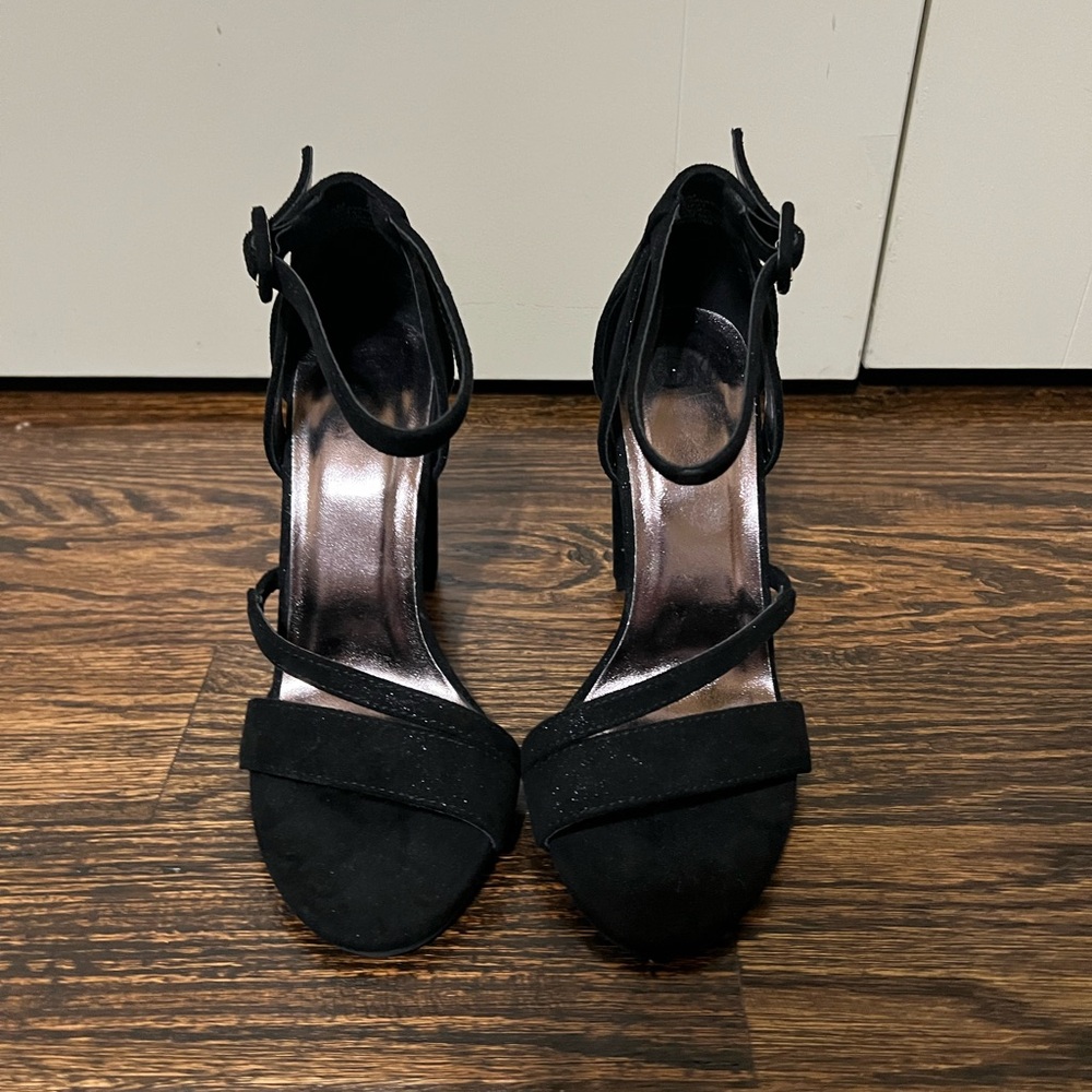 Black heels and only worn once.